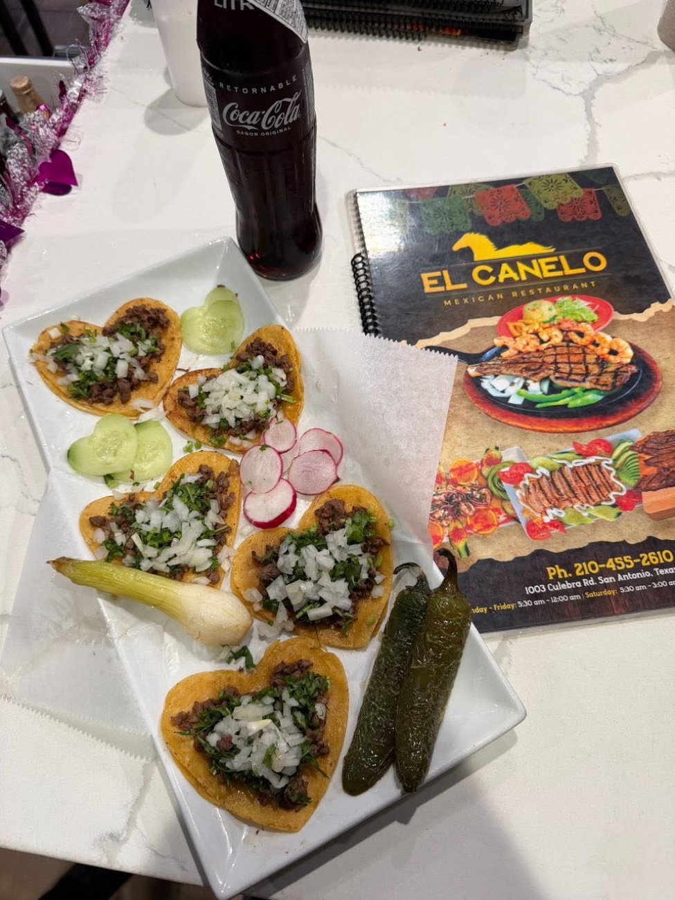 Street tacos on heart-shaped tortillas with radishes and jalapeños