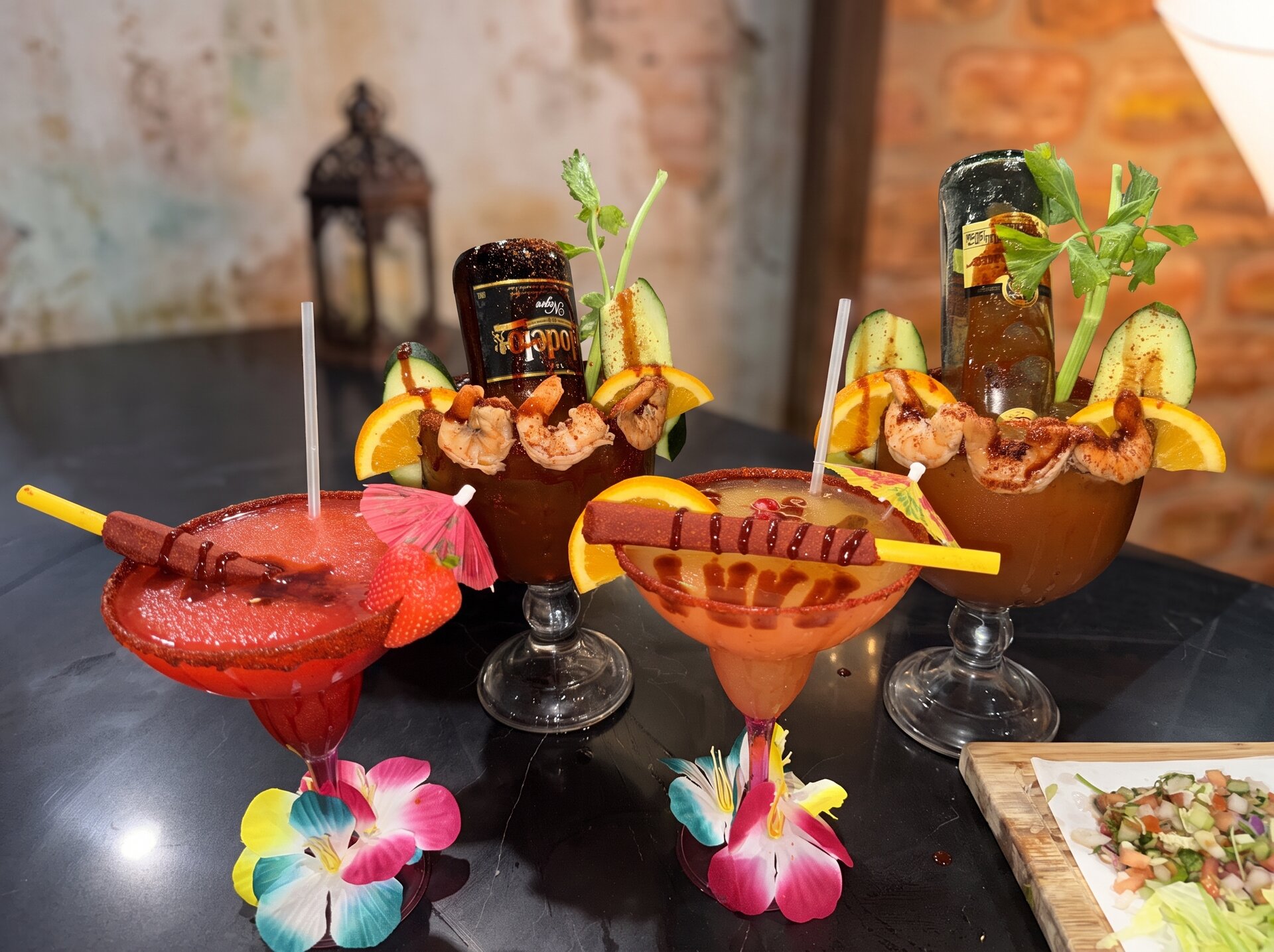Micheladas loaded with shrimp and fruit