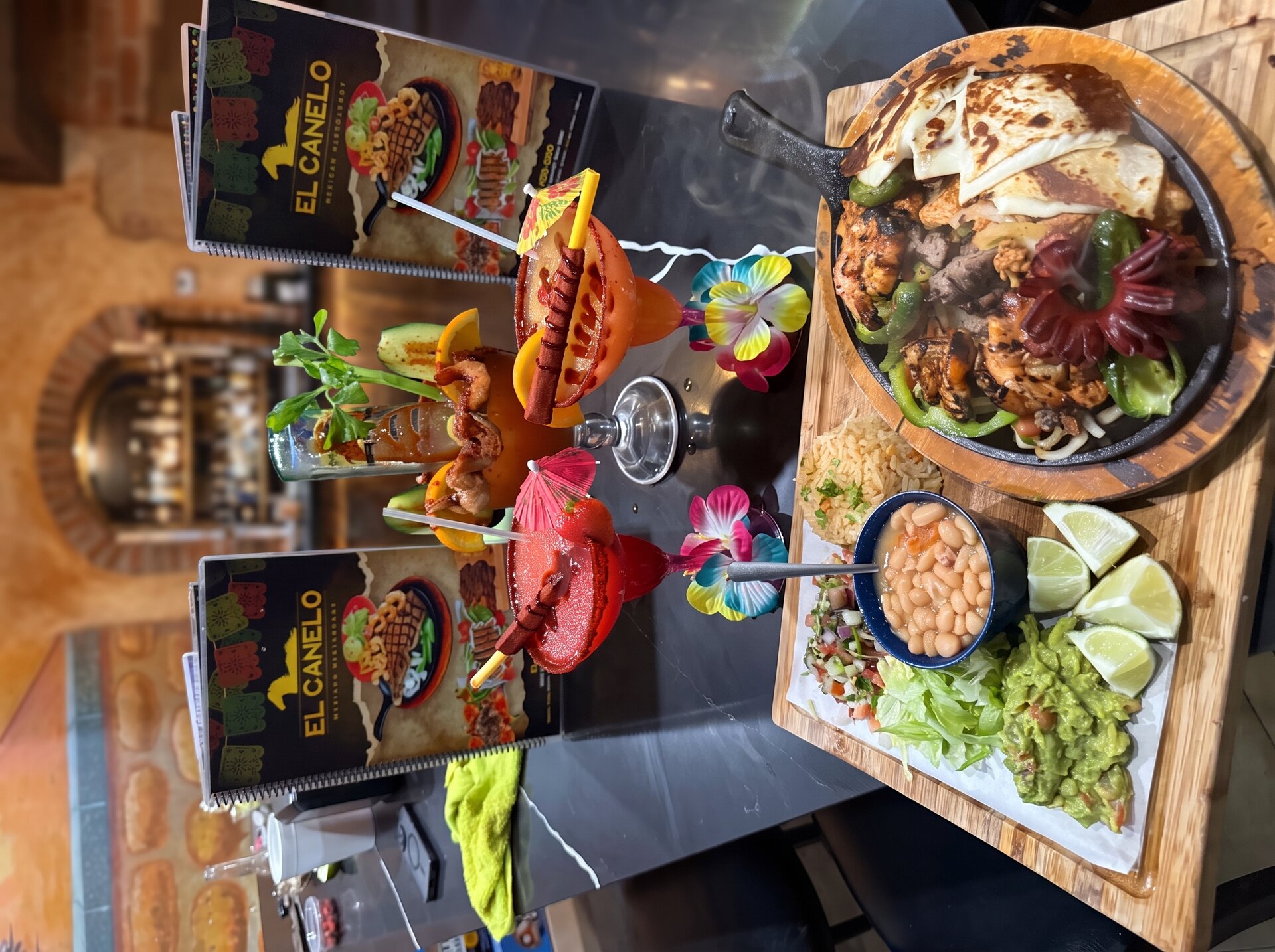 Full botana spread with micheladas