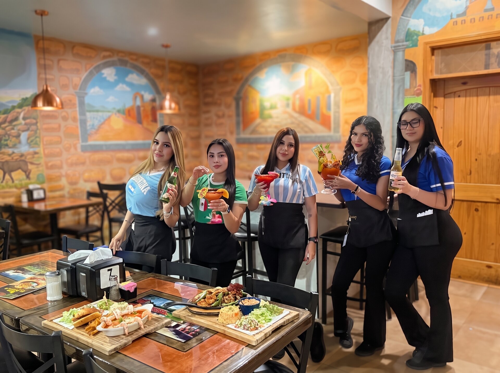The El Canelo team raising a toast